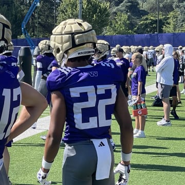 Tristan Dunn (12), standing next to Peyton Waters (22), made his first fall camp appearance. 