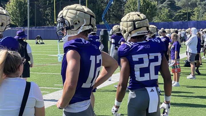 Tristan Dunn (12), standing next to Peyton Waters (22), made his first fall camp appearance. 