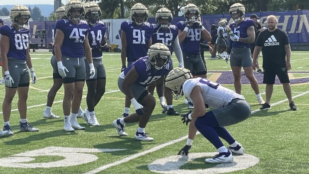 Jayden Wayne lines up in a one-on-one drill against tight end Owen Coutts. 