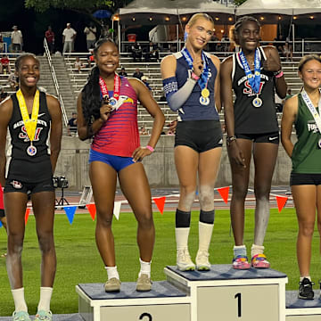 Transgender athlete AB Hernandez (left on top stand) and Kira Gant Hatcher were among the winners at the California (CIF) State Championships at Buchanan High School in Clovis on May 31. California is one of at least two states this week being litigated for its transgender policies that have been followed by state high school sports governing bodies. 