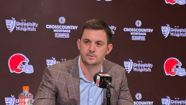Tommy Rees speaks to reporters during his introductory news conference as Cleveland Browns offensive coordinator.