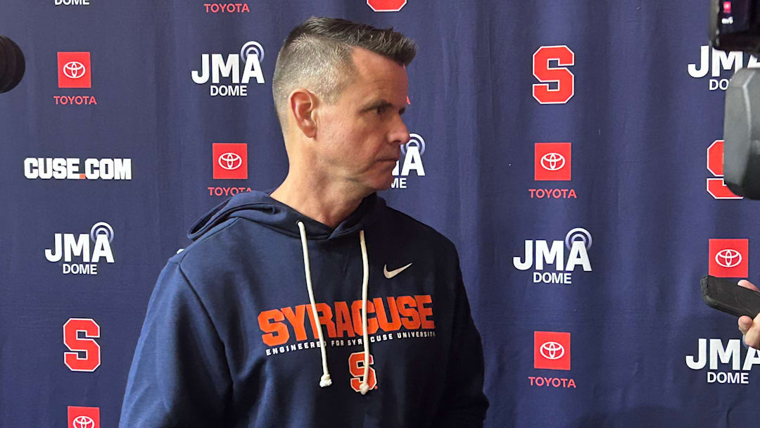 Syracuse quarterbacks coach Sean Ryan fields questions from the media.