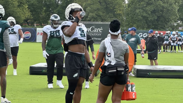 Eagles outside linebacker/edge rusher Nolan Smith takes a water break during Eagles training camp.