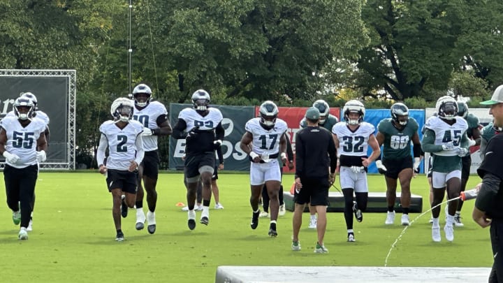 Eagles defense goe through some pre-practice warmups during training camp.