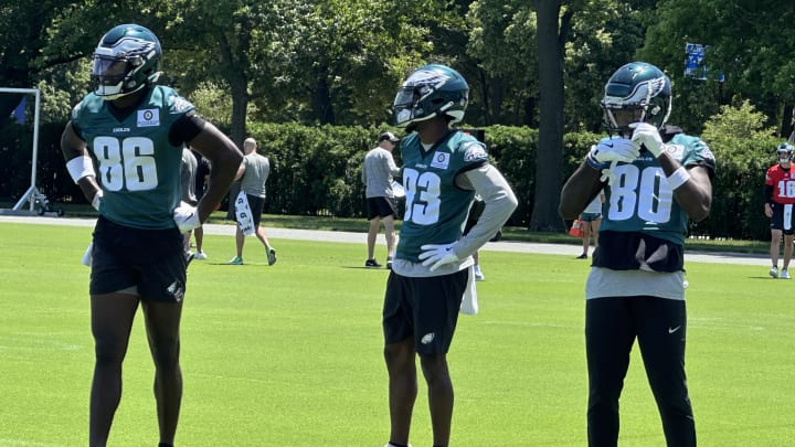 Eagles receivers, from left to right, Joseph Ngata, John Ross, and Parris Campbell run through drills during the team's OTA practice on May 30, 2024