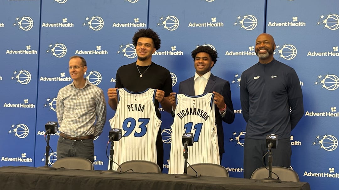June 27, 2025: Jase Richardson and Noah Penda pose with Orlando Magic president of basketball operations Jeff Weltman and head coach Jamahl Mosley at an introductory Press Conference. 