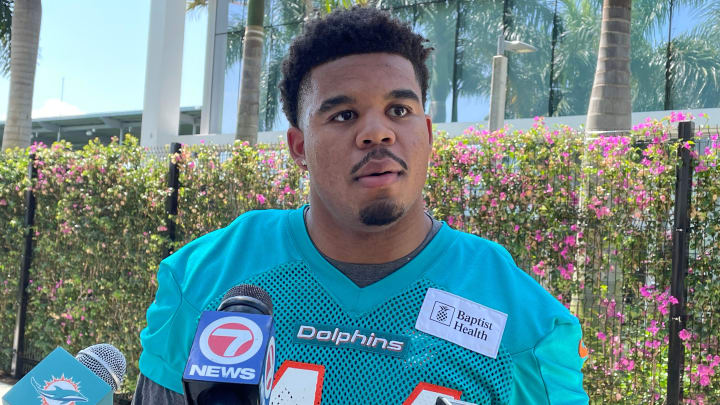 Edge rusher Chop Robinson, the Miami Dolphins' first-round draft pick, meets with reporters during minicamp.