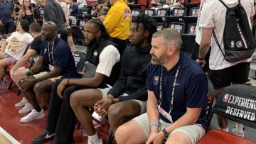 Indiana Pacers centers Isaiah Jackson and James Wiseman sit between two Pacers assistant coaches at a summer league game on July 12, 2024. (Mandatory Photo Credit: Tony East)