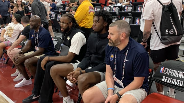 Indiana Pacers centers Isaiah Jackson and James Wiseman sit between two Pacers assistant coaches at a summer league game on July 12, 2024. (Mandatory Photo Credit: Tony East)