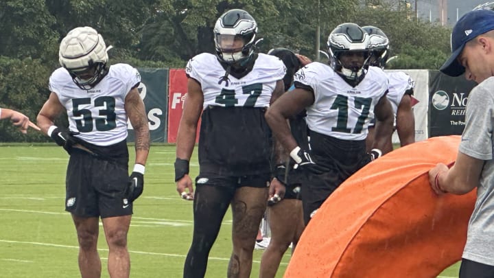 Eagles prep for tackliing drill during traing camp. From let to right: Zack Baun, Brandon Smith, and Nakobe Dean