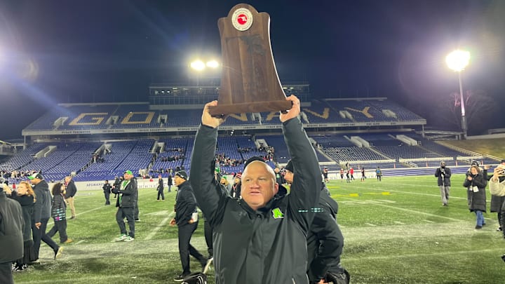 Arundel coach Jack Welsh holds up the Maryland Class 3A football trophy Saturday night. The Wildcats defeated previously undefeated Linganore at Navy-Marine Corps Stadium for their first title since 1975 and finished No. 11 in the Final 2024 Top 25 Maryland High School Football Rankings. Arundel coach Jack Welsh holds up the Maryland Class 3A football trophy Saturday night. The Wildcats defeated previously undefeated Linganore at Navy-Marine Corps Stadium for their first title since 1975 and finished No. 11 in the Final 2024 Top 25 Maryland High School Football Rankings.