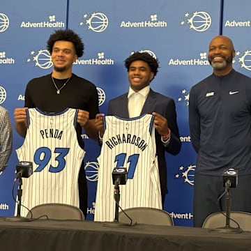 June 27, 2025: Jase Richardson and Noah Penda pose with Orlando Magic president of basketball operations Jeff Weltman and head coach Jamahl Mosley at an introductory Press Conference. 