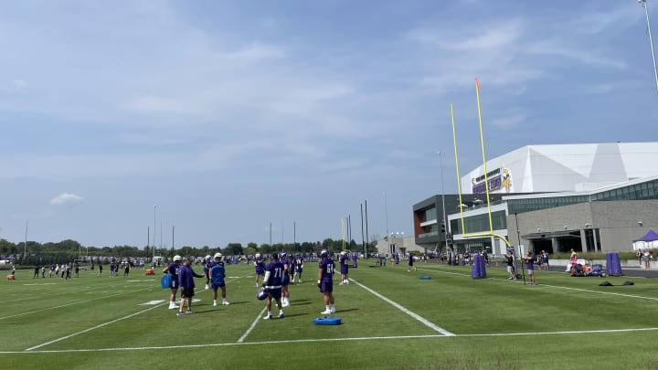 Vikings offensive linemen at training camp at TCO Performance Center.