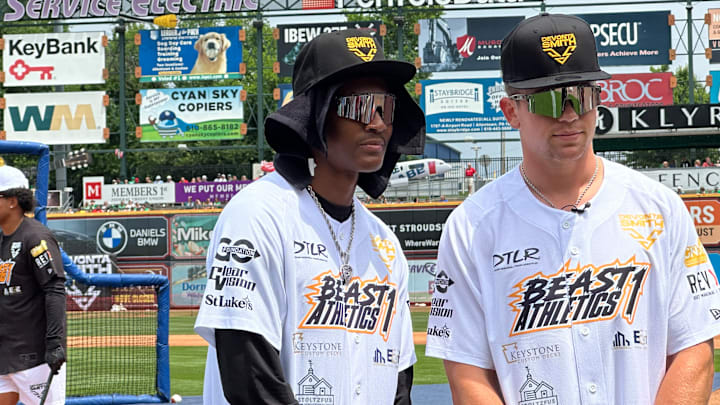 Eagles teammates DeVonta Smith and Cooper DeJean get ready for the home run contest at Smith's 5th annual Celebrity All-Star Game on June 28. 2025 in Allentown.