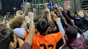 The St. Benedict's Prep soccer team celebrates after defeating Delbarton, 4-0, to earn its first sectional trophy since returning to the NJSIAA last winter.