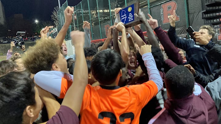 The St. Benedict's Prep soccer team celebrates after defeating Delbarton, 4-0, to earn its first sectional trophy since returning to the NJSIAA last winter.