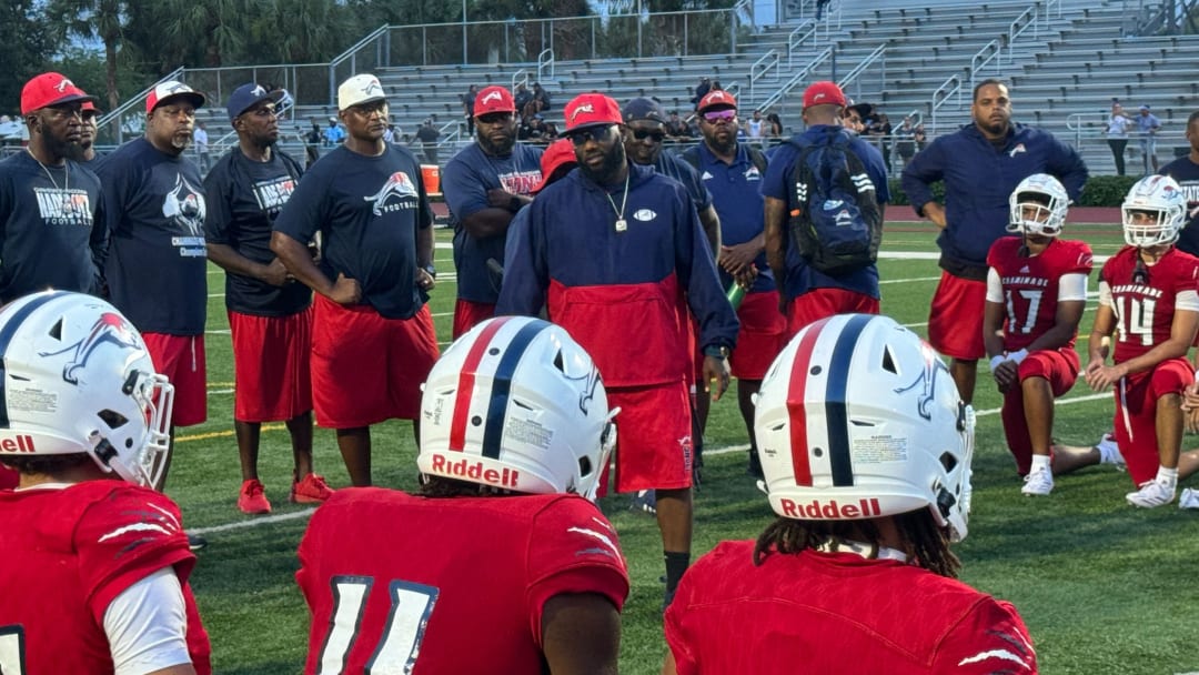 Chaminade-Madonna coach Dameon Jones addresses team after 56-0 preseason win over Archbishop Carroll on Aug. 16, 2024.