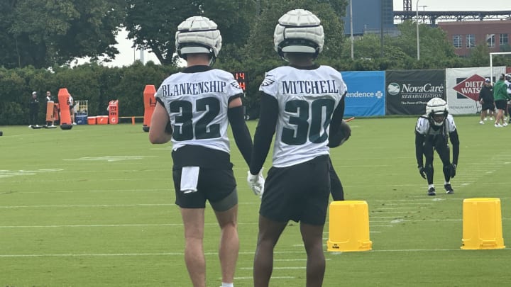 Quinyon Mitchell (right) with safety Reed Blankenship