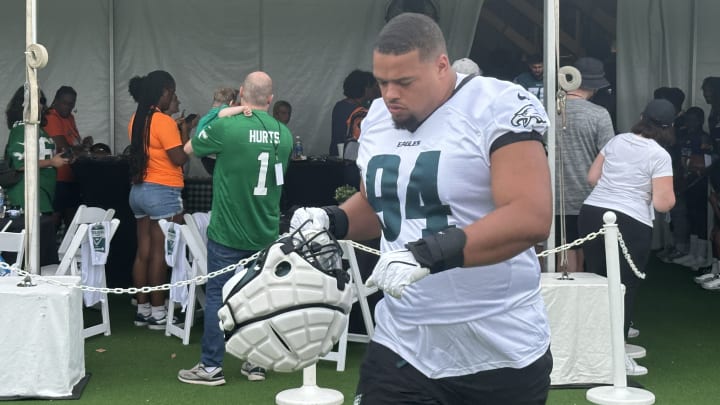 Eagls defensive tackle PJ Mustipher takes the field during training camp.