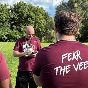 BFA-Fairfax/Lamoille head coach Craig Sleeman talks to players during the first day of preseason practices on Monday, Aug. 12, 2024.