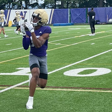 Justice Williams hauls in a fall camp pass. 