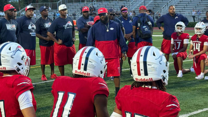 Chaminade-Madonna coach Dameon Jones addresses team after 56-0 preseason win over Archbishop Carroll on Aug. 16, 2024.