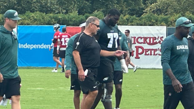 Mekhi Becton and Jeff Stoutland