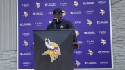 Minnesota Vikings defensive coordinator Brian Flores speaks to the media before training camp practice on July 25.