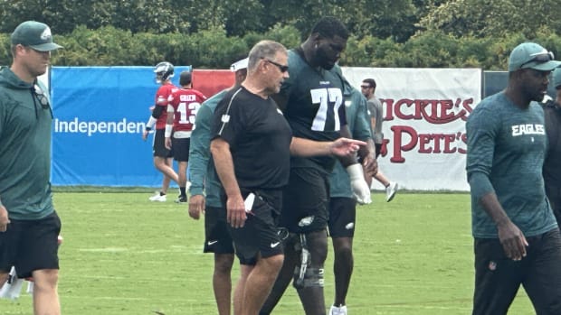 Mekhi Becton and Jeff Stoutland