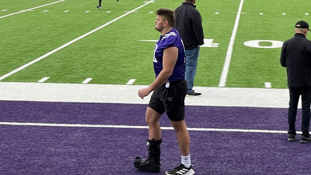 Jaxson Kirkland is shown wearing a boot in 2022 spring football practice. 