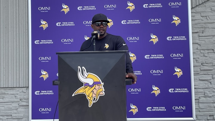 Minnesota Vikings defensive coordinator Brian Flores speaks to the media before training camp practice on July 25.