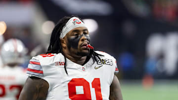 Jan 20, 2025; Atlanta, GA, USA; Ohio State Buckeyes defensive tackle Tyleik Williams (91) against the Notre Dame Fighting Irish during the CFP National Championship college football game at Mercedes-Benz Stadium. Mandatory Credit: Mark J. Rebilas-Imagn Images