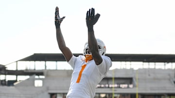 Nov 30, 2024; Nashville, Tennessee, USA;  Tennessee Volunteers wide receiver Dont'e Thornton Jr. (1) celebrates his touchdown with his teammates against the Vanderbilt Commodores during the first half at FirstBank Stadium. Mandatory Credit: Steve Roberts-Imagn Images