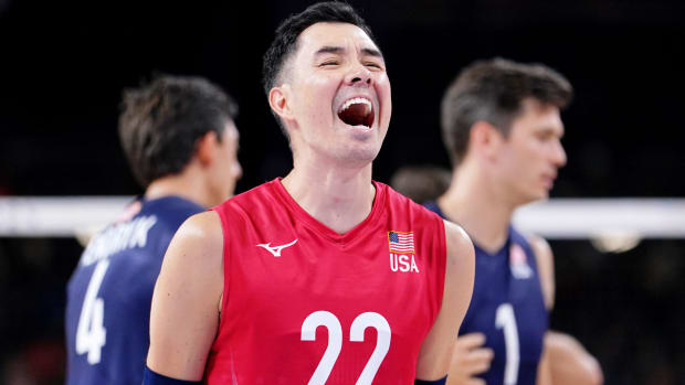 United States libero Erik Shoji (22) celebrates after their win against Germany 