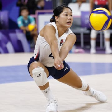 Jul 31, 2024; Paris, France; United States libero Justine Wong-Orantes (4) hits the ball against Serbia in a pool A match during the Paris 2024 Olympic Summer Games at South Paris Arena 1.