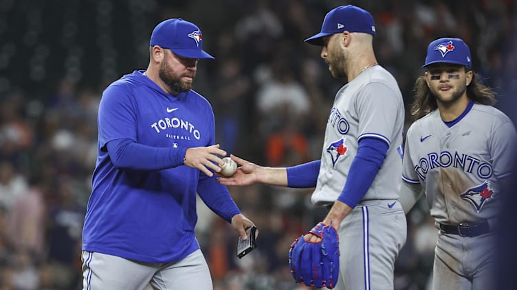 Apr 17, 2023; Houston, Texas, USA; Toronto Blue Jays relief pitcher Anthony Bass (52) hands the ball