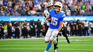 Oct 27, 2024; Inglewood, California, USA; Los Angeles Chargers wide receiver Ladd McConkey (15) runs the ball for a touchdown against the New Orleans Saints during the second half at SoFi Stadium. Mandatory Credit: Gary A. Vasquez-Imagn Images