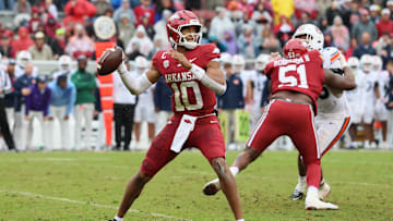 Oct 25, 2025; Fayetteville, Arkansas, USA; Arkansas Razorbacks quarterback Taylen Green (10) passes during the third quarter against the Auburn Tigers at Donald W. Reynolds Razorback Stadium. Auburn won 33-24. Mandatory Credit: Nelson Chenault-Imagn Images