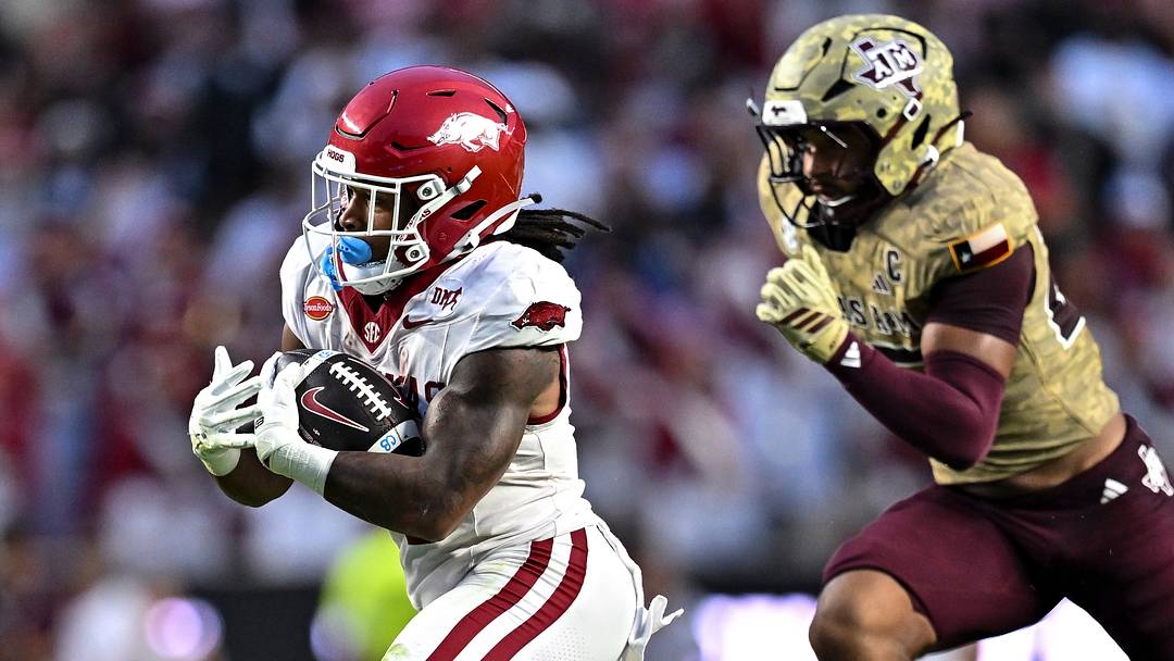 Arkansas Razorbacks running back Sutton Smith (5) runs the ball during the first half against the Texas A&M Aggies at Kyle Field.