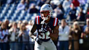 Oct 26, 2025; Foxborough, Massachusetts, USA;  New England Patriots running back Treveyon Henderson (32) warms up prior to the first half against the Cleveland Browns at Gillette Stadium. Mandatory Credit: Bob DeChiara-Imagn Images