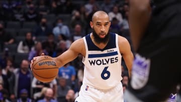 Feb 9, 2022; Sacramento, California, USA; Minnesota Timberwolves guard Jordan McLaughlin (6) controls the ball against the Sacramento Kings during the second quarter at Golden 1 Center. Mandatory Credit: Kelley L Cox-USA TODAY Sports