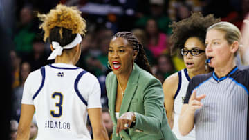 Notre Dame head coach Niele Ivey coaches guard Hannah Hidalgo (3) during a NCAA women's basketball game between Notre Dame and SMU at Purcell Pavilion on Sunday, Jan. 19, 2025, in South Bend.