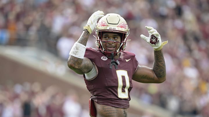 Aug 30, 2025; Tallahassee, Florida, USA; Florida State Seminoles defensive back Earl Little Jr. (0) reacts after a play against the Alabama Crimson Tide during the second half at Doak S. Campbell Stadium. Mandatory Credit: Melina Myers-Imagn Images