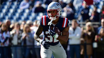 New England Patriots running back Treveyon Henderson (32) warms up prior to the first half against the Cleveland Browns at Gillette Stadium.