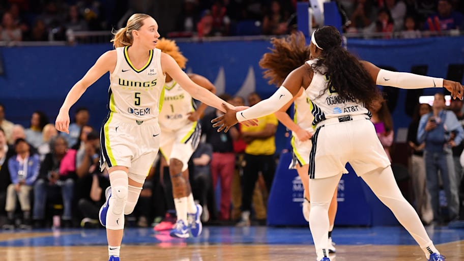 Dallas Wings guard Paige Bueckers showed support for Arike Ogunbowale after their loss to the Indiana Fever. | Patrick Gorski-Imagn Images
