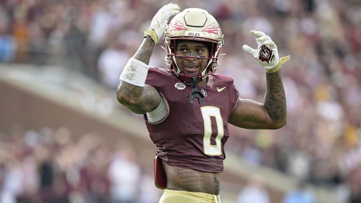 Aug 30, 2025; Tallahassee, Florida, USA; Florida State Seminoles defensive back Earl Little Jr. (0) reacts after a play against the Alabama Crimson Tide during the second half at Doak S. Campbell Stadium. Mandatory Credit: Melina Myers-Imagn Images
