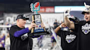 Dec 26, 2024; Phoenix, AZ, USA; Kansas State Wildcats head coach Chris Klieman celebrates with the trophy after defeating the Rutgers Scarlet Knights during the Rate Bowl at Chase Field. Mandatory Credit: Mark J. Rebilas-Imagn Images
