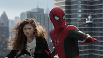 MJ (Zendaya) prepares to freefall with Spider-man in Columbia Pictures' SPIDER-MAN: NO WAY HOME. Courtesy of Sony Pictures. ©2021 CTMG. All Rights Reserved. MARVEL and all related character names: © & ™ 2021 MARVEL