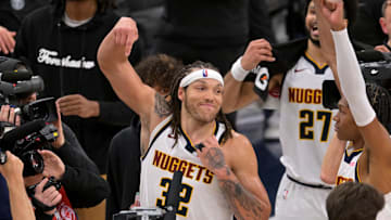 Apr 26, 2025; Inglewood, California, USA; Denver Nuggets forward Aaron Gordon (32) celebrates after the game winning dunk to defeat the Los Angeles Clippers 101-99 in game four of round one of the 2024 NBA Playoffs at Intuit Dome. Mandatory Credit: Jayne Kamin-Oncea-Imagn Images
