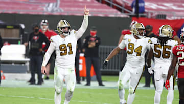 Nov 8, 2020; Tampa, Florida, USA; New Orleans Saints defensive end Trey Hendrickson (91) celebrates as he makes a sack against the Tampa Bay Buccaneers during the second half at Raymond James Stadium. Mandatory Credit: Kim Klement-Imagn Images